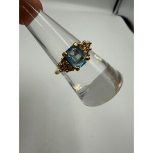 Gold Tone Emerald Cut Blue Cocktail Ring with Clear Accent Stones Size 7.5